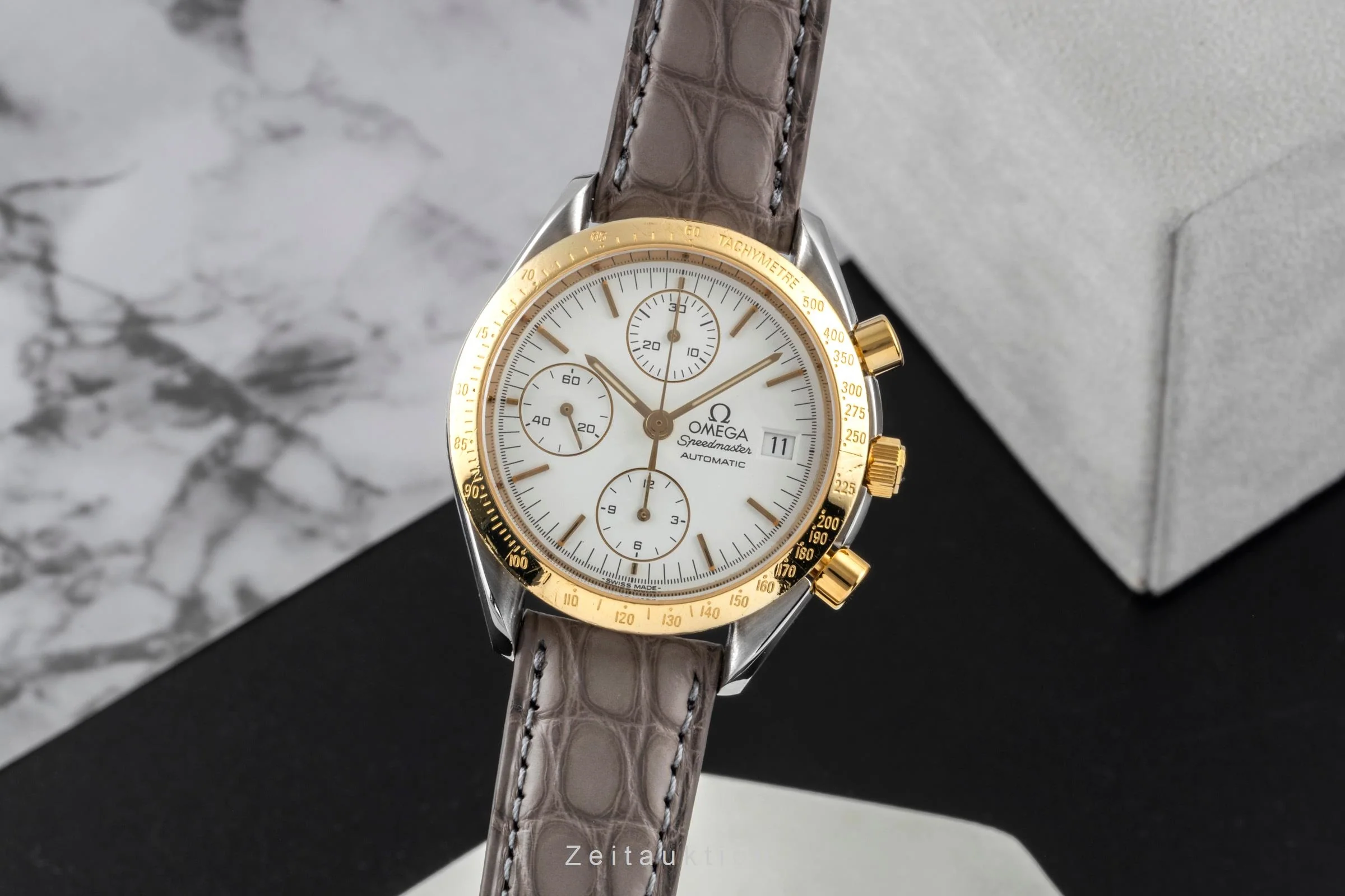 Omega Speedmaster Date chronograph steel / gold automatic men's watch 3311.20 LP: 8200EUR  [2600526] - Image 2