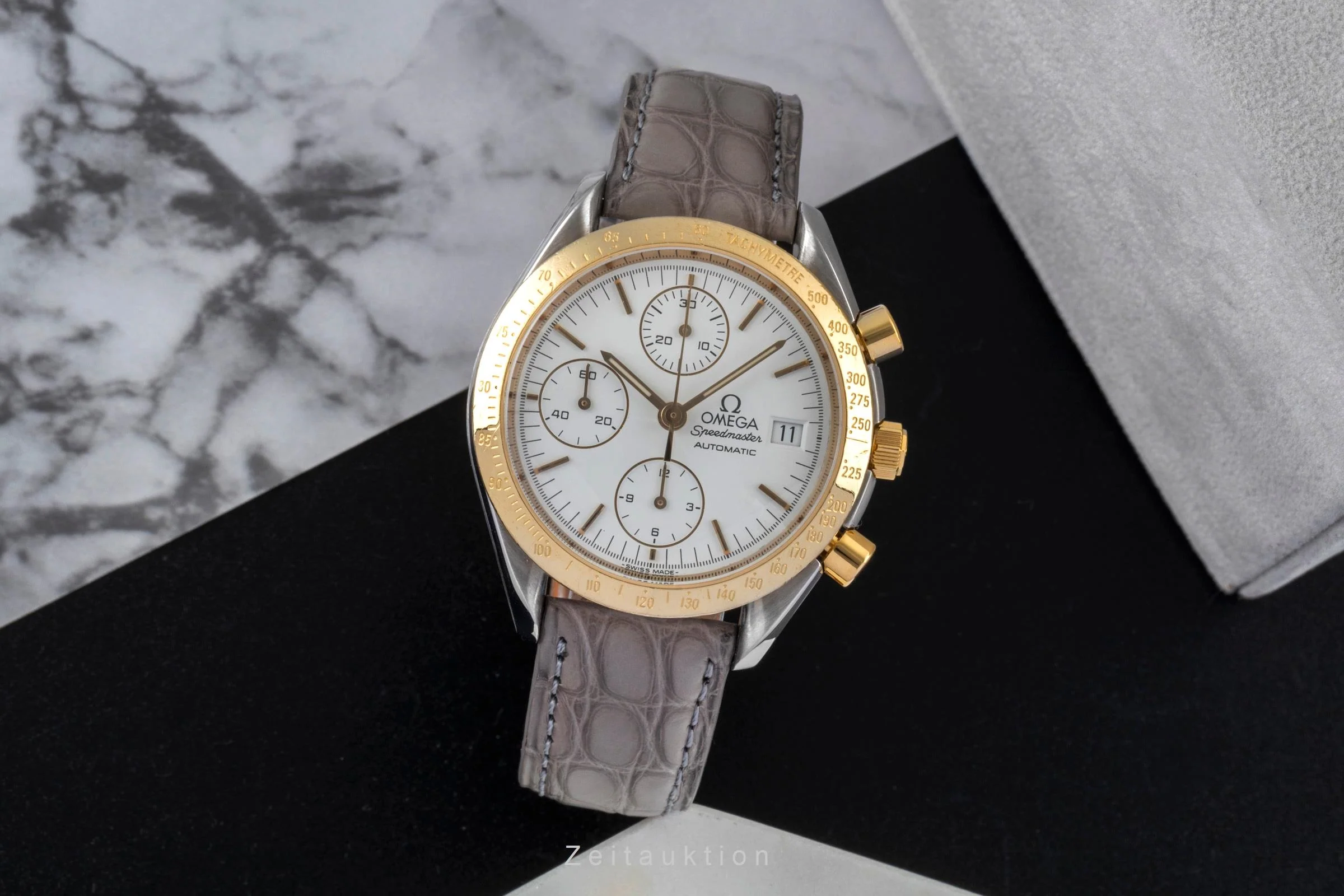 Omega Speedmaster Date chronograph steel / gold automatic men's watch 3311.20 LP: 8200EUR  [2600526] - Image 4